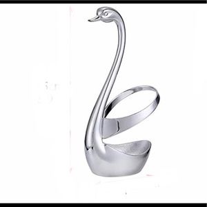 Pair of silver Swans base holders ( never used)